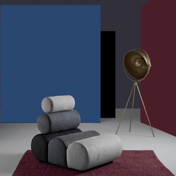 Poltrona di design composta da cilindri imbottiti Aris di Excò