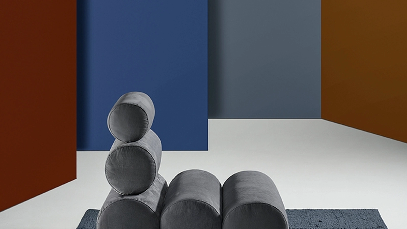 Poltrona di design composta da cilindri imbottiti Aris di Excò